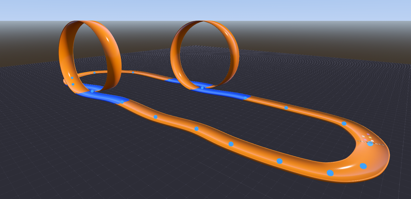 A wide shot of a completed track showing a curve leading into a vertical loop